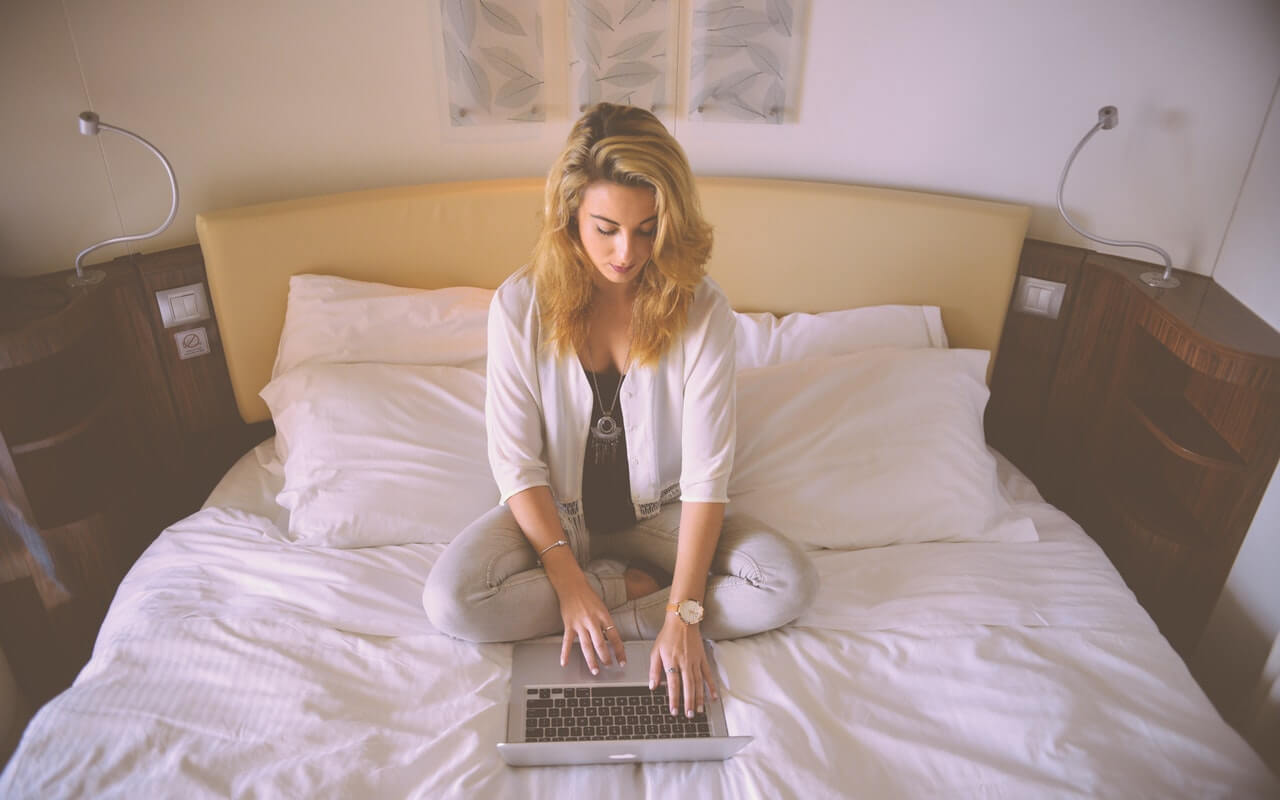 person-woman-hotel-laptop